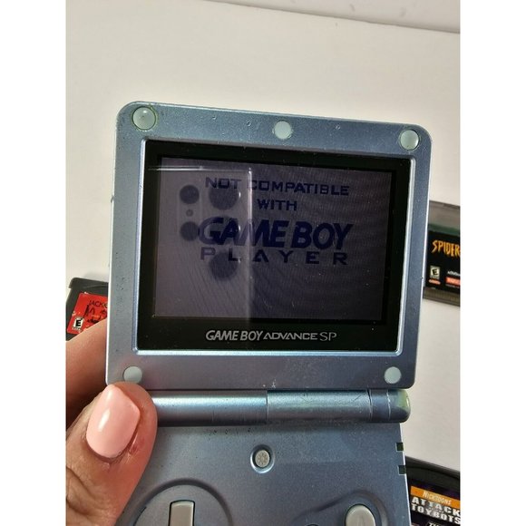 Nintendo Game Boy Advance SP Pearl Blue Bundle W/ 7 Games & Charger - Picture 2 of 10